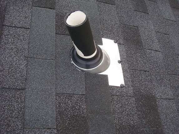 New shingles around new pipe collar