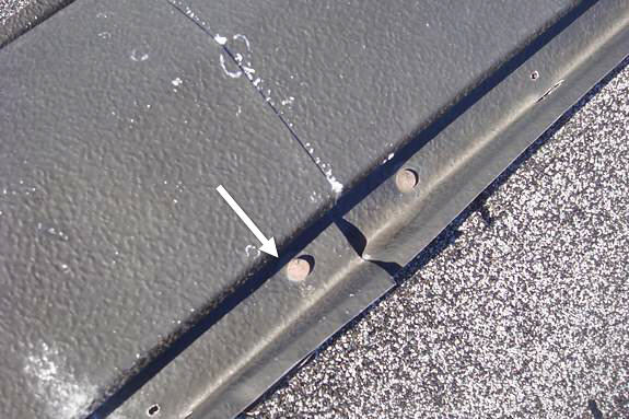 Metal ridge vent seam leak
