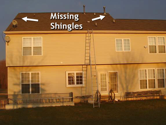 missing shingles on the rear of house