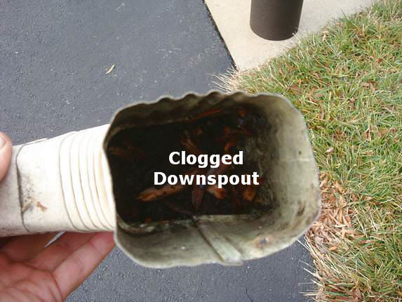 Clogged aluminum downspout